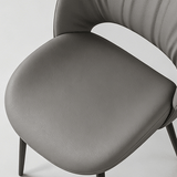 Modern Curved Leather Dinning Chair - Contemporary Comfort for Stylish Spaces - StoolTopia