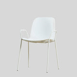 Modern Perforated Plastic Dining Chair with Metal Frame for Contemporary Spaces - StoolTopia