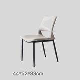 Sleek and Modern: White Leather Dining Chair with Ergonomic Design and Sturdy Black Legs - StoolTopia